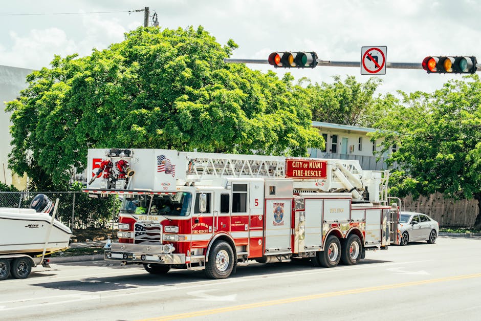 City of Miami fire-rescue truck with dive team module on a sunny street.