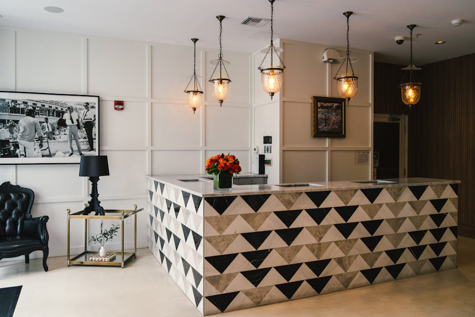 Explore the elegant reception area of a Miami Beach boutique hotel, showcasing modern coastal design and vibrant decor.